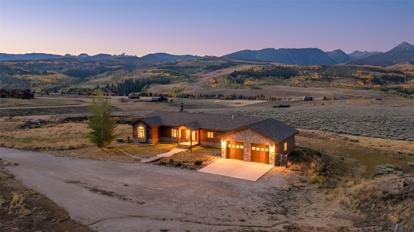 845 Elk Run Road Silverthorne, CO 80498 - Photo 50 of 50 a view of a lake with a mountain
