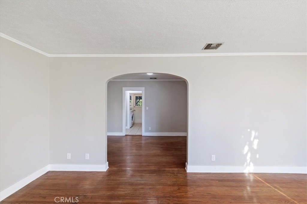 4311 Sunnyside Drive Riverside, CA 92506 - Photo 12 of 40 a view of empty room with wooden floor