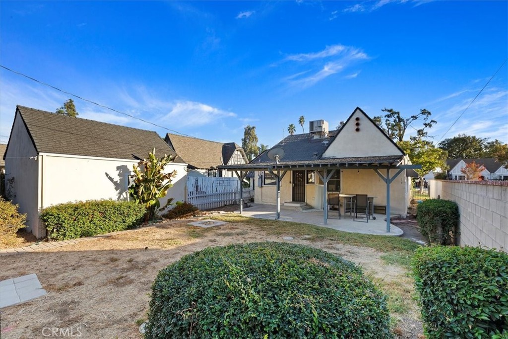 4311 Sunnyside Drive Riverside, CA 92506 - Photo 34 of 40 a front view of a house with a yard