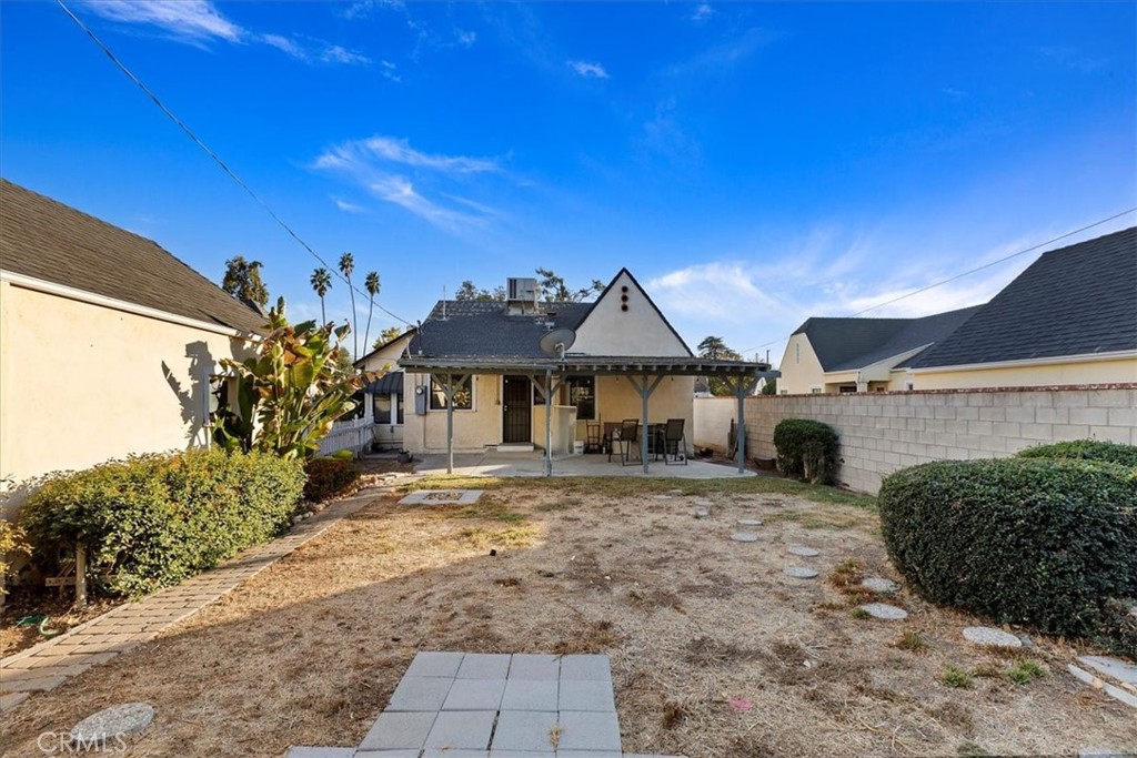 4311 Sunnyside Drive Riverside, CA 92506 - Photo 35 of 40 a front view of a house with a yard