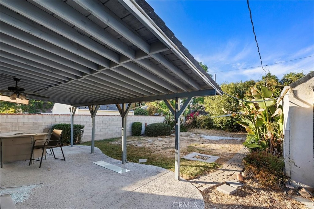 4311 Sunnyside Drive Riverside, CA 92506 - Photo 39 of 40 a patio with table and chairs