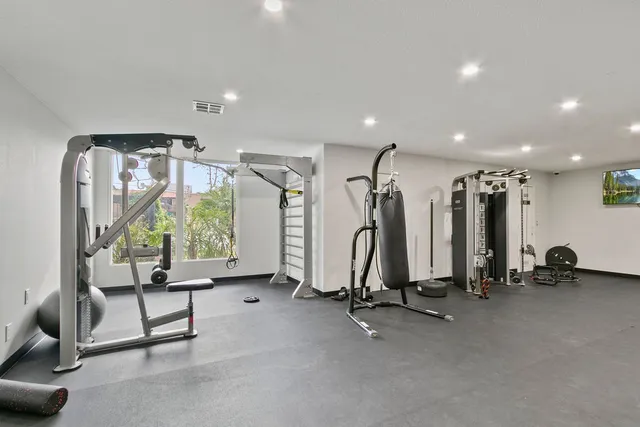 a view of a room with gym equipment