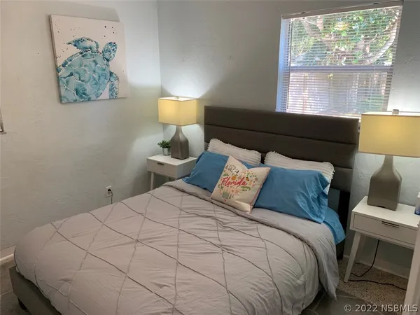 a bathroom with a toilet and shower