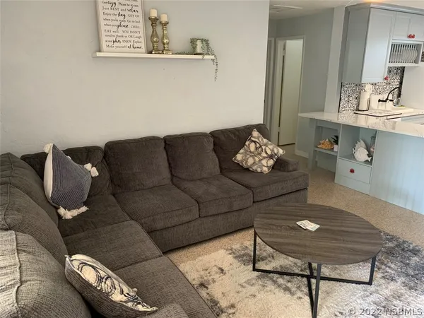 a living room with furniture