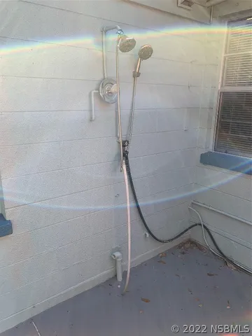 a view of a tree in a yard