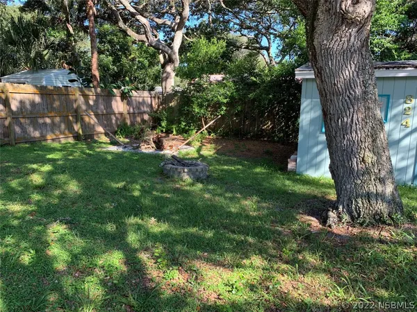 a outdoor space with view of a bathroom