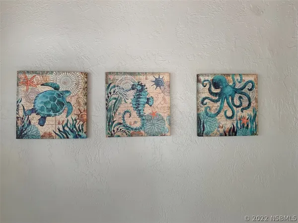 outdoor view of house with backyard space and sitting area