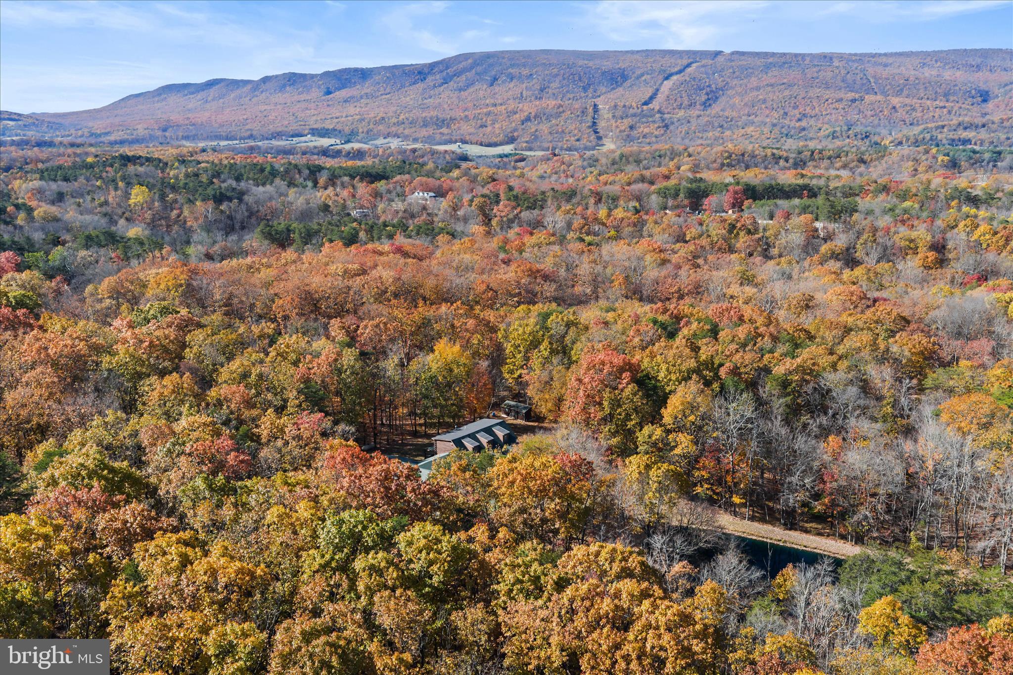 4176 Timber Ridge Road Berkeley Springs, WV 25411 - Photo 51 of 61 an aerial view of residential house and sandy dunes