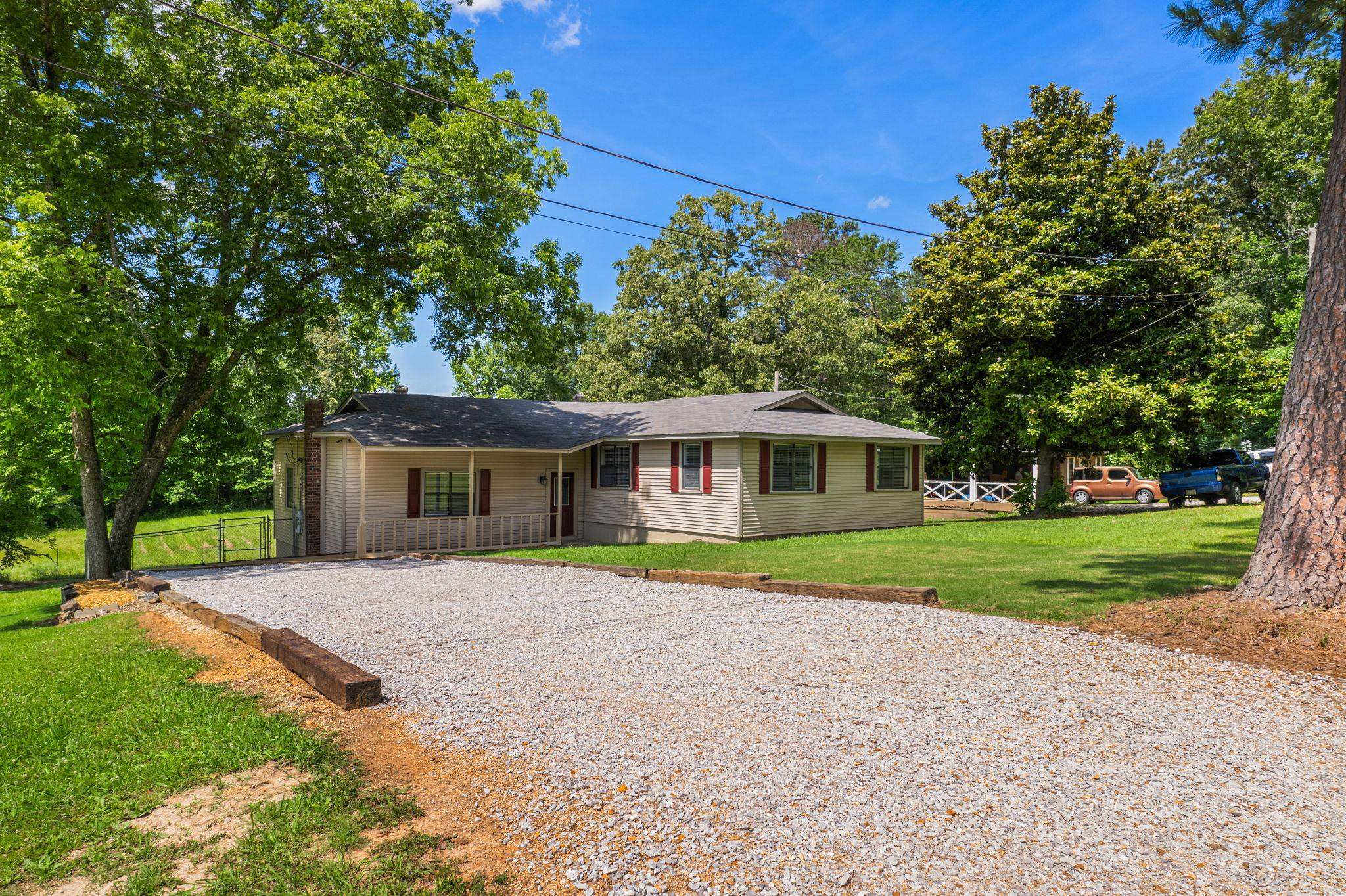 1600 West Sawyer Road Corinth, MS 38834 - Photo 3 of 35 a front view of a house with a yard