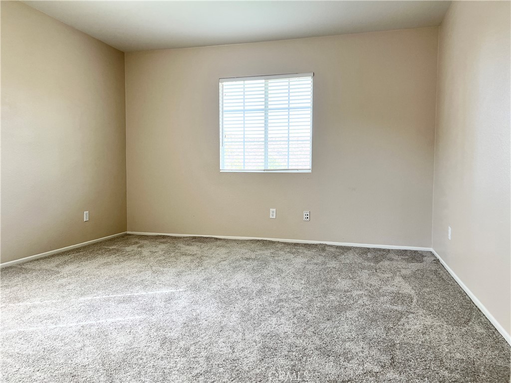 32040 Poppy Way Lake Elsinore, CA 92532 - Photo 17 of 27 an empty room with a window
