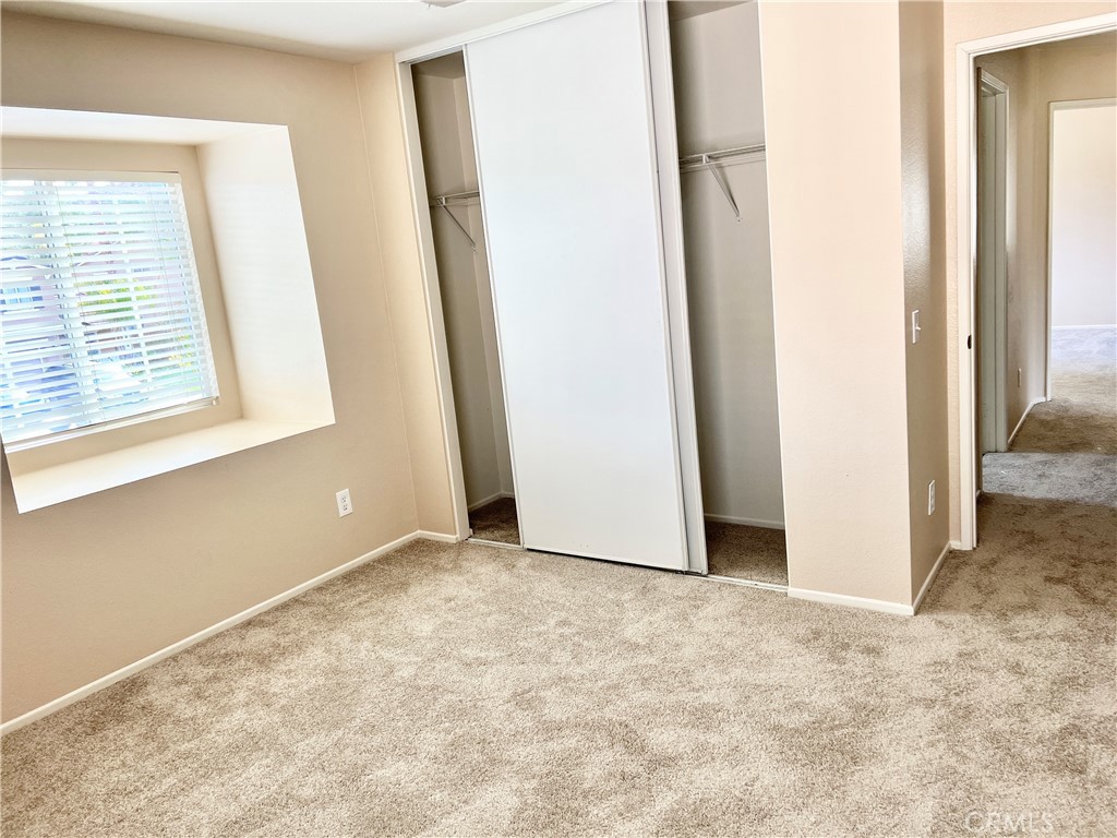 32040 Poppy Way Lake Elsinore, CA 92532 - Photo 18 of 27 a view of an empty room with a window