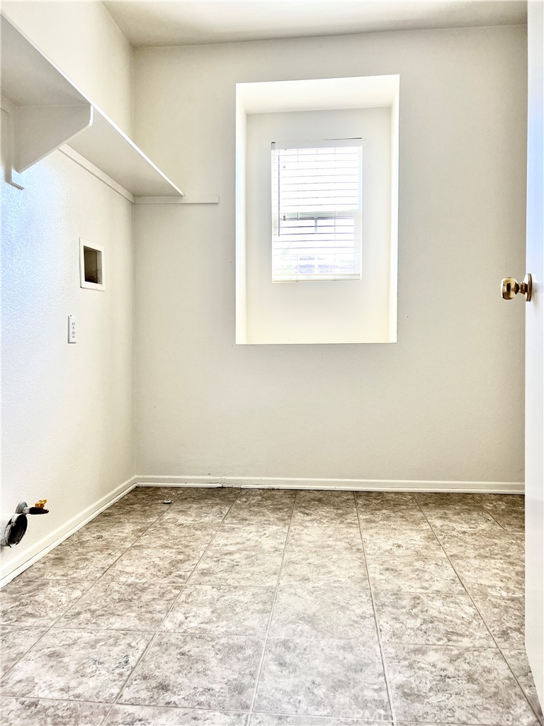 32040 Poppy Way Lake Elsinore, CA 92532 - Photo 20 of 27 an empty room with a window