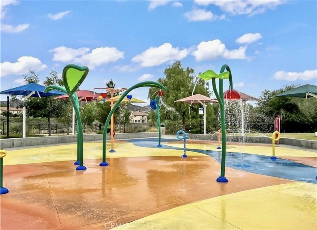 32040 Poppy Way Lake Elsinore, CA 92532 - Photo 27 of 27 a view of a swimming pool with a patio