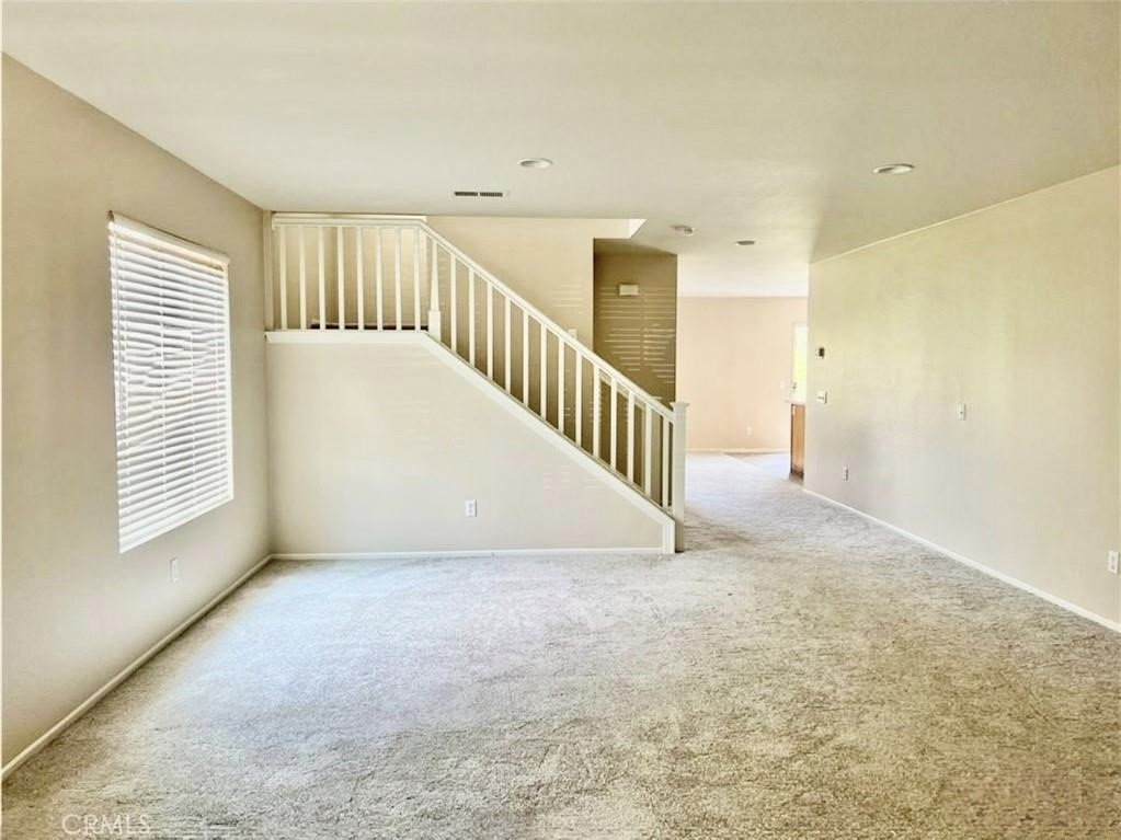 32040 Poppy Way Lake Elsinore, CA 92532 - Photo 3 of 27 a view of an empty room with a window