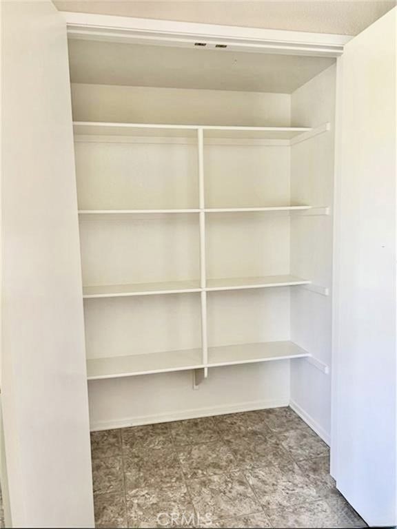 32040 Poppy Way Lake Elsinore, CA 92532 - Photo 9 of 27 a room with a closet