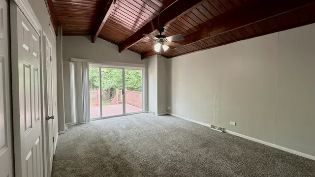 a view of a livingroom with a ceiling fan