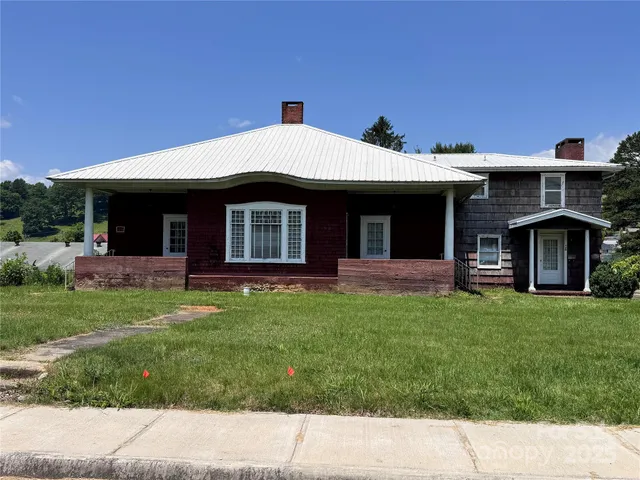 a view of a house with a garden