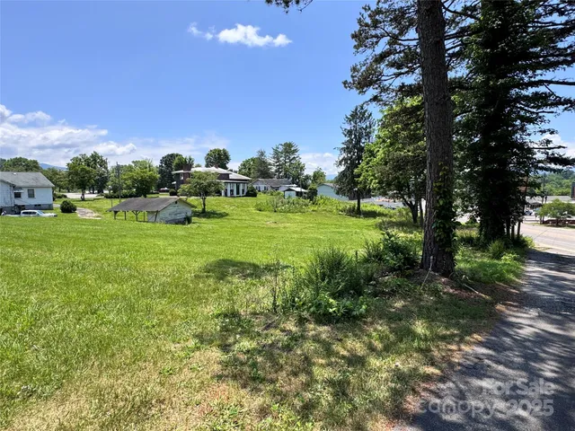 a view of a golf course with a lake