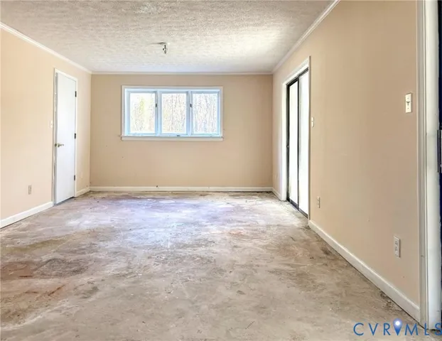 an empty room with windows