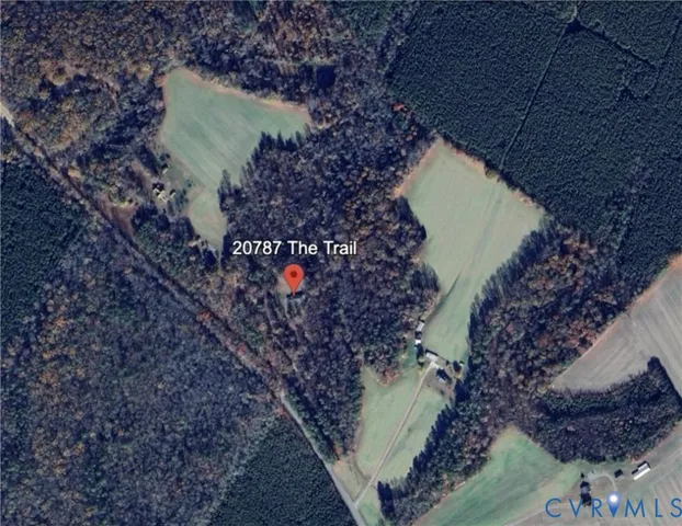 a view of a back yard of a house