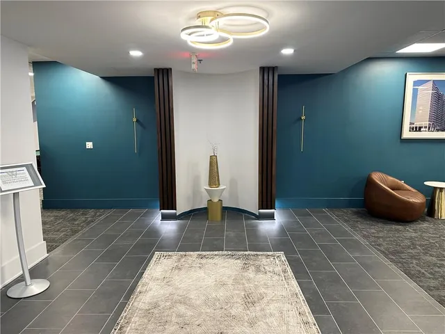 a outdoor living space with furniture and a potted plant