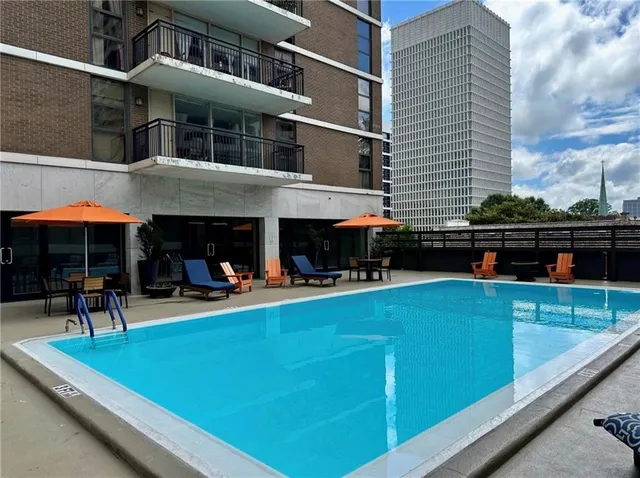 a view of parking garage with cars