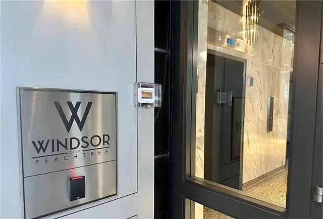 a view of elevator with hallway