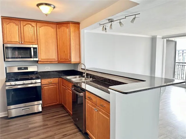 wooden floor in a room with a window