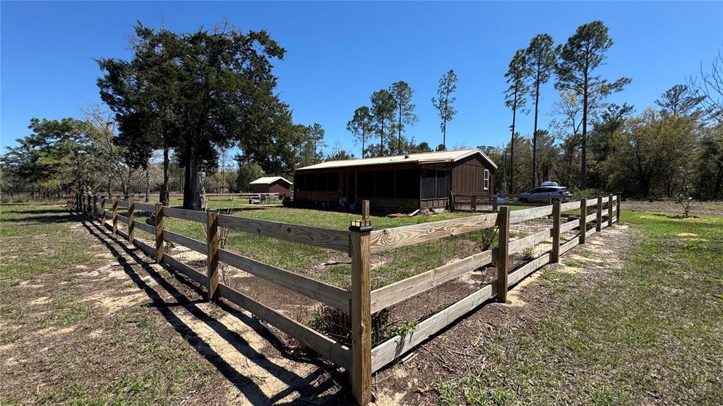 6845 South Sunnyview Point Homosassa, FL 34446 - Photo 3 of 33 a view of a park with large trees