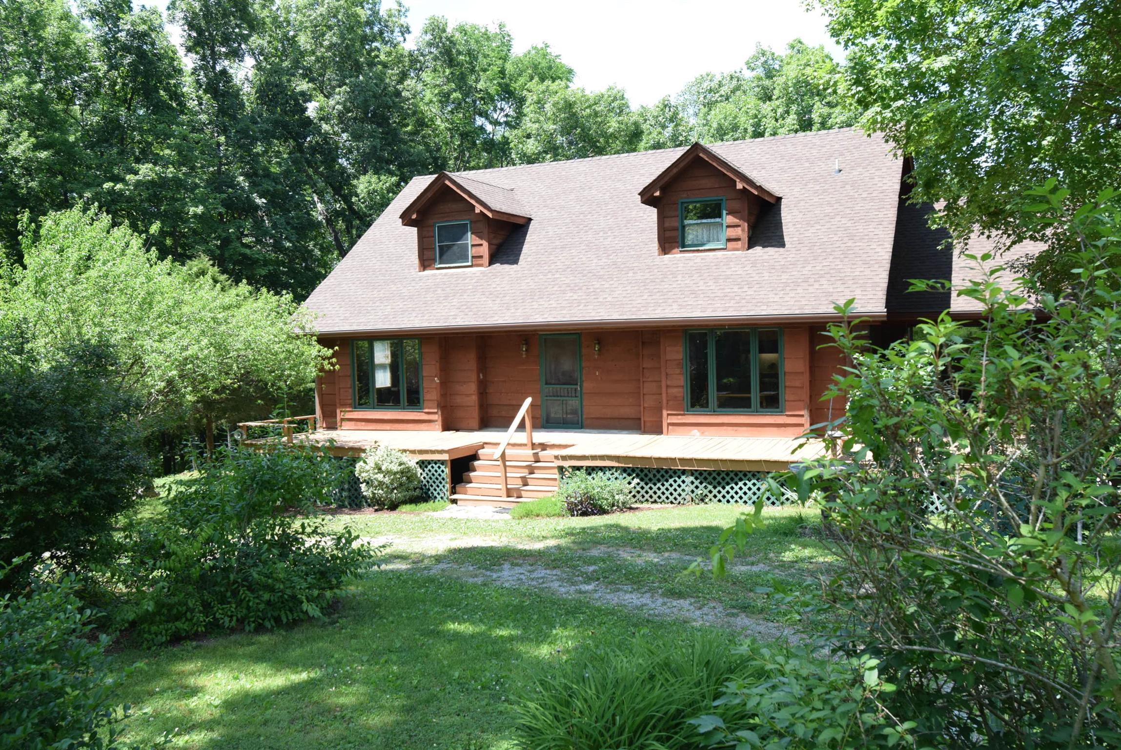 2242 Cedar Grove Road Lebanon, TN 37087 - Photo 1 of 21 a front view of a house with yard and green space