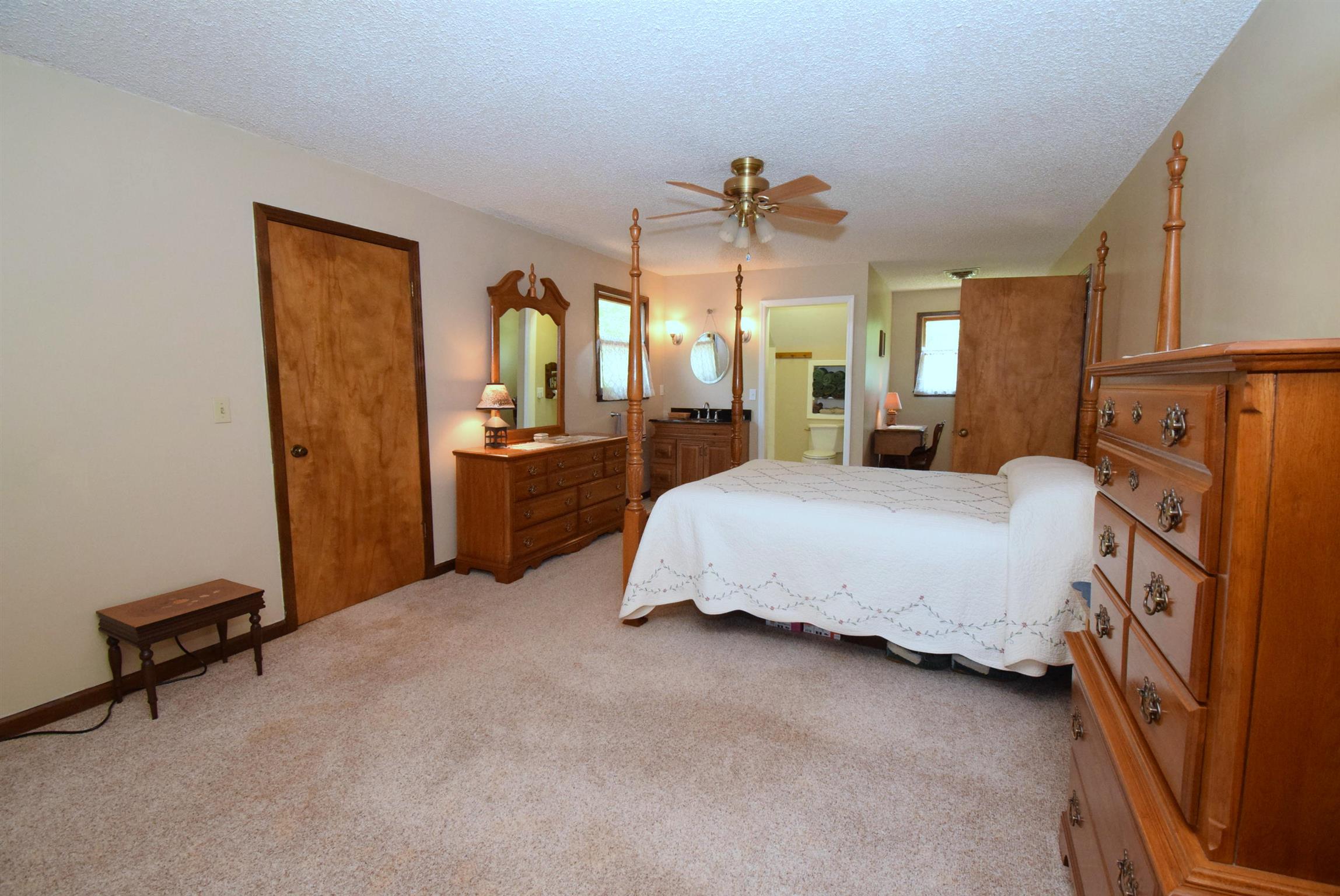 2242 Cedar Grove Road Lebanon, TN 37087 - Photo 13 of 21 a spacious bedroom with a bed and dresser