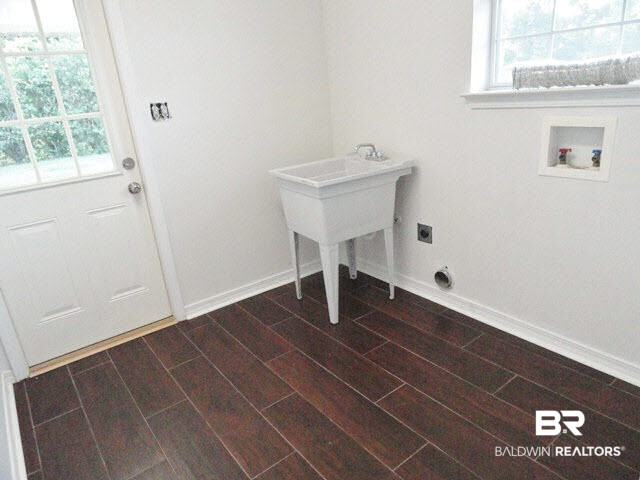 27927 Rileywood Drive Daphne, AL 36526 - Photo 19 of 24 Laundry Room has Exterior Door and Mud Sink