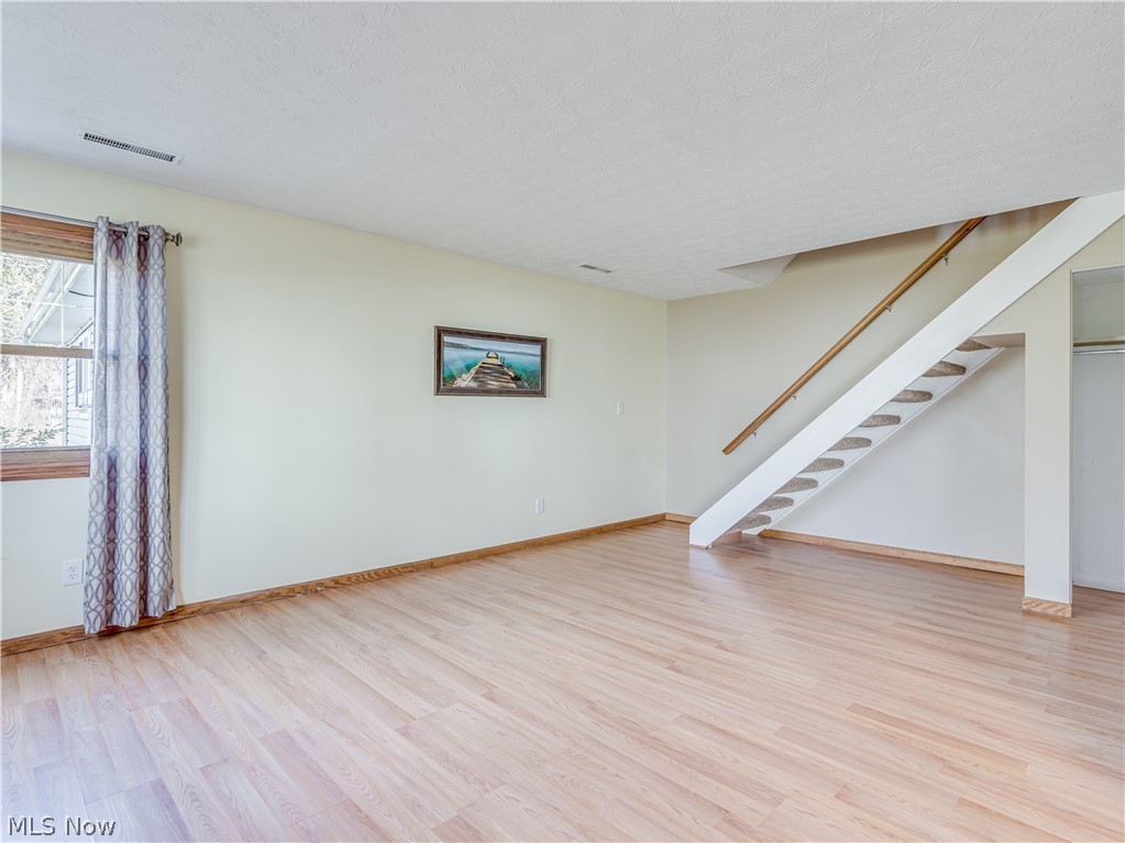 2500 Raber Road, Unit 5C Uniontown, OH 44685 - Photo 7 of 19 Staircase leading to the upstairs bedrooms and bath