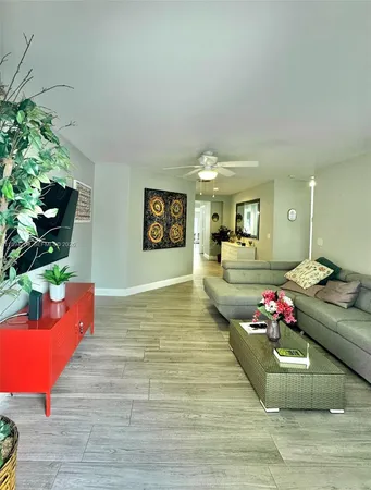 a room with furniture and flowers