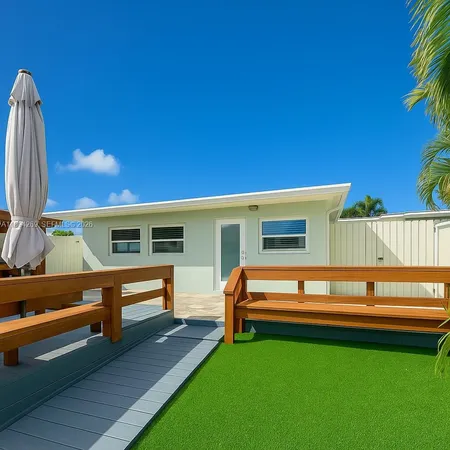 a view of a backyard with a garden