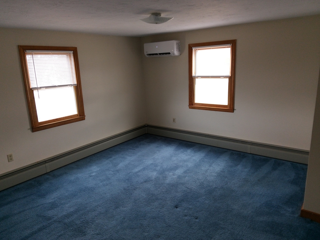 121 King Philip Road Worcester, MA 01606 - Photo 15 of 31 an empty room with a window