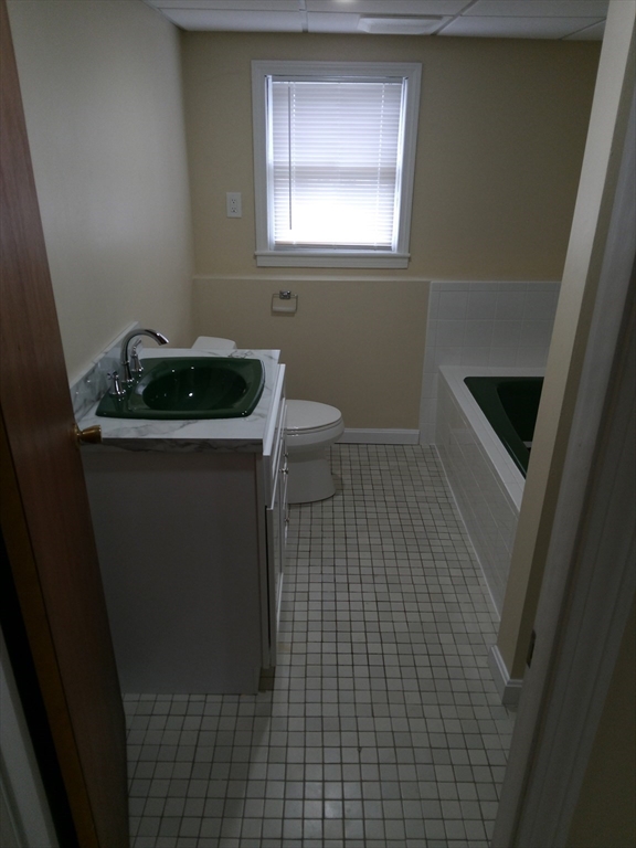 121 King Philip Road Worcester, MA 01606 - Photo 30 of 31 a bathroom with a sink and a toilet