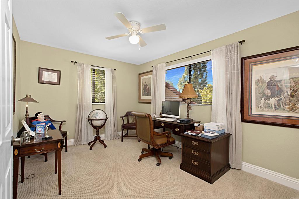2046 Balboa Circle Vista, CA 92081 - Photo 25 of 37 a view of a workspace with furniture and a window