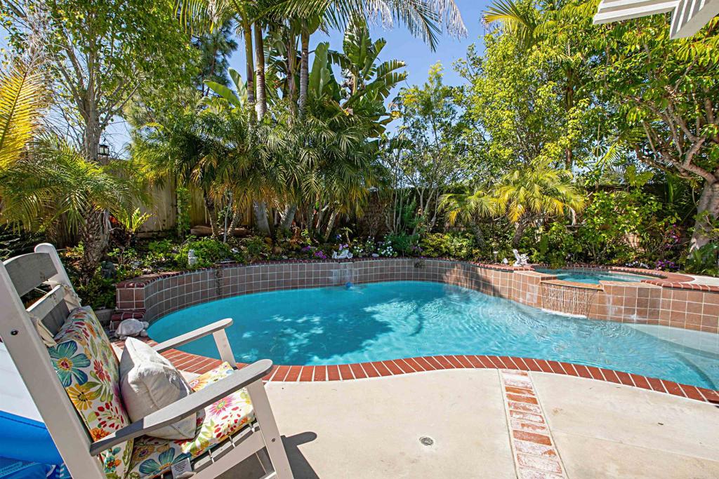 2046 Balboa Circle Vista, CA 92081 - Photo 35 of 37 a view of a swimming pool with a lounge chair