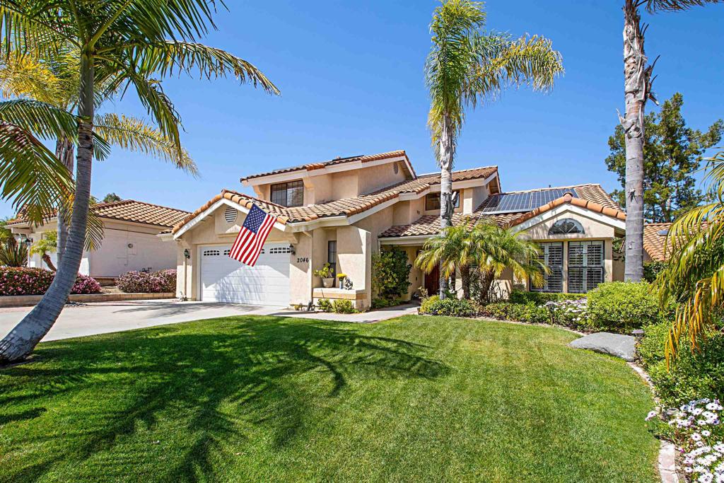 2046 Balboa Circle Vista, CA 92081 - Photo 5 of 37 a front view of house with yard and seating area