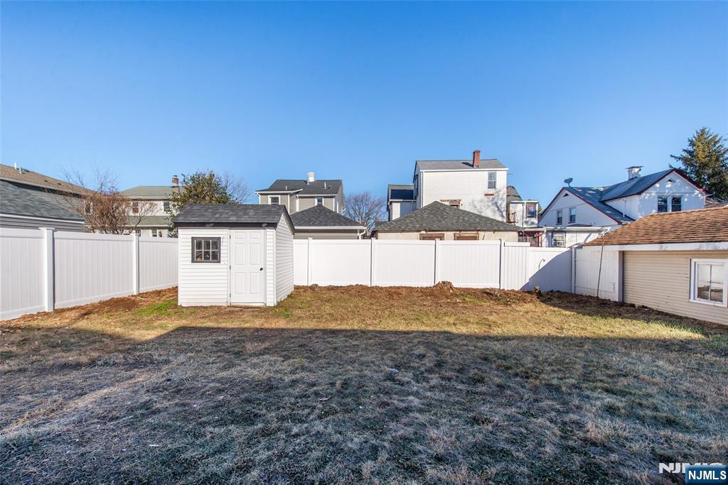 50 Grand Avenue Ridgefield Park, NJ 07660 - Photo 34 of 36 a view of a house with a yard