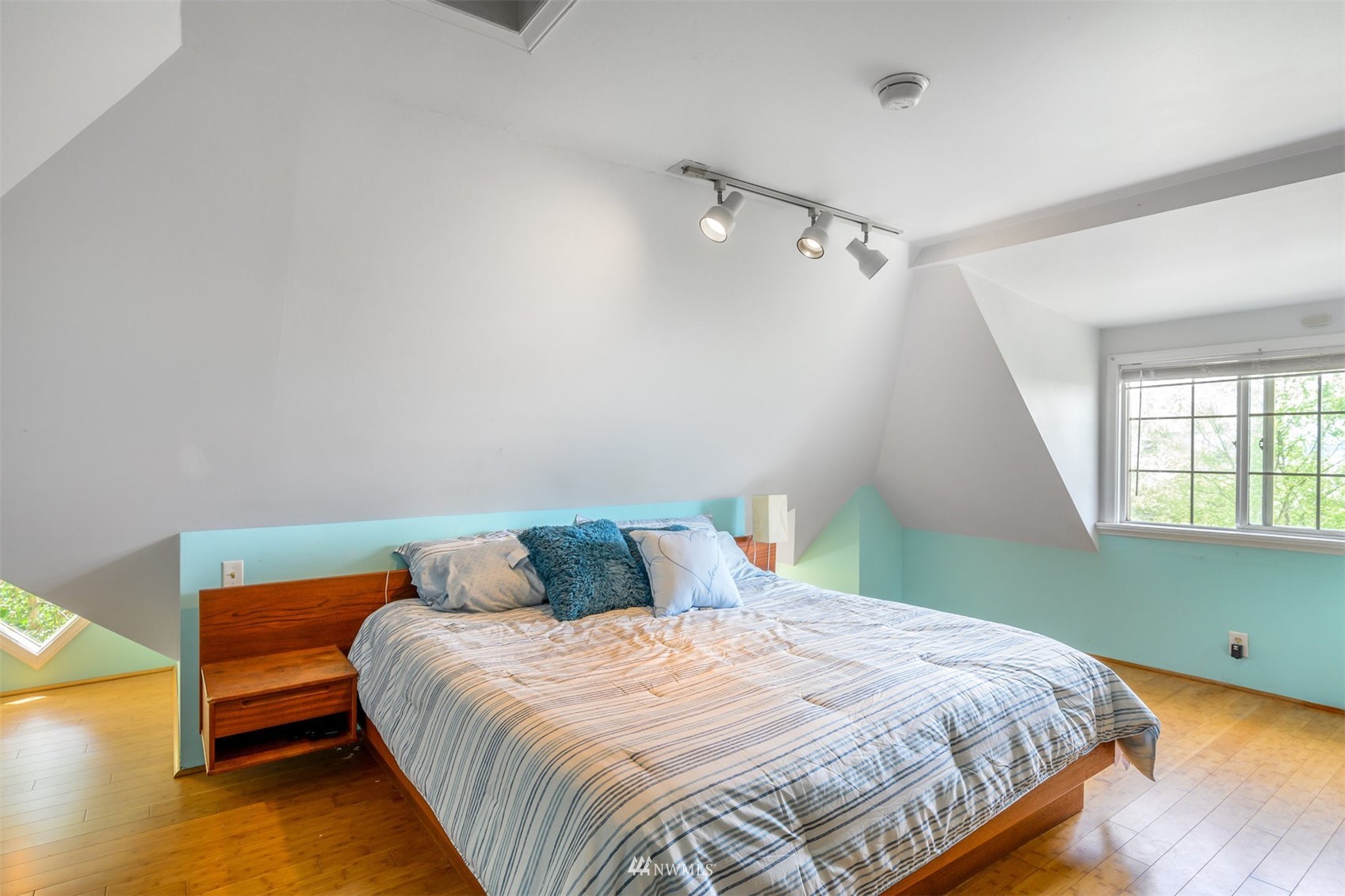2313 Rucker Avenue Everett, WA 98201 - Photo 21 of 35 a bedroom with a bed and a window