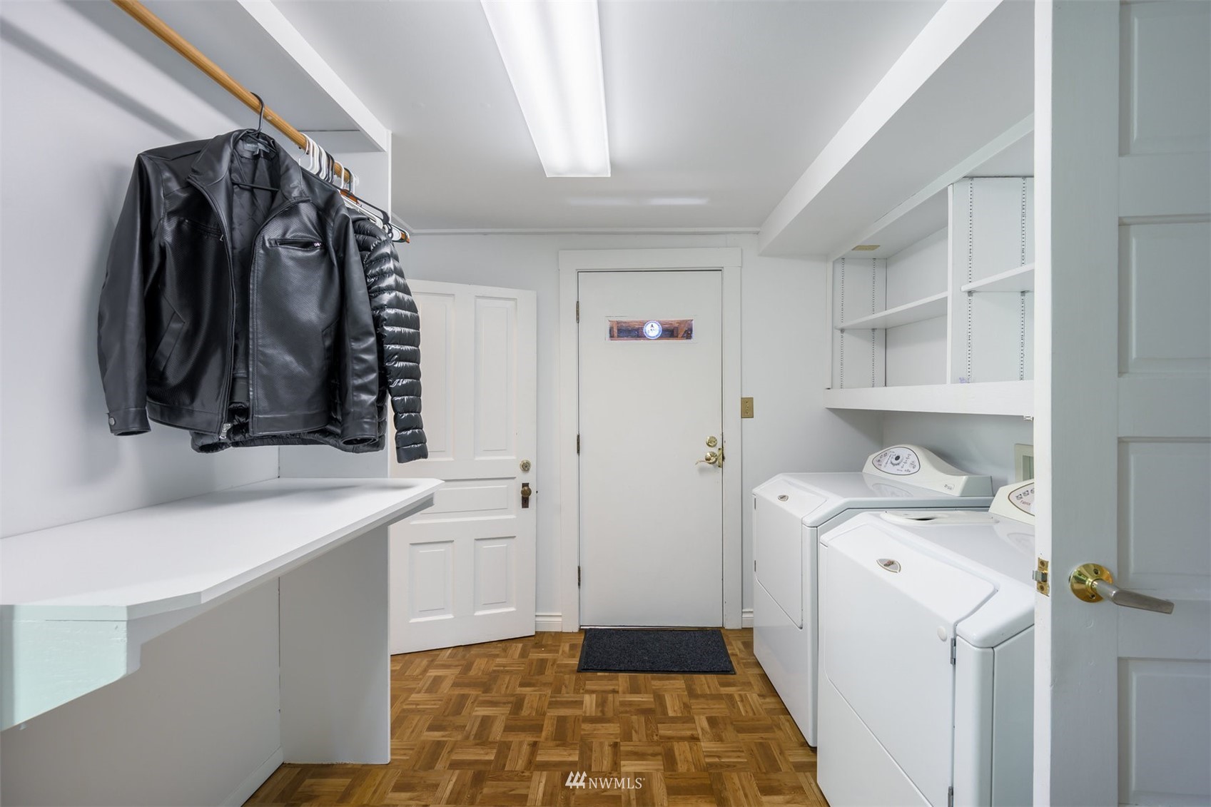 2313 Rucker Avenue Everett, WA 98201 - Photo 26 of 35 a view of walk in closet with clothes and shoes