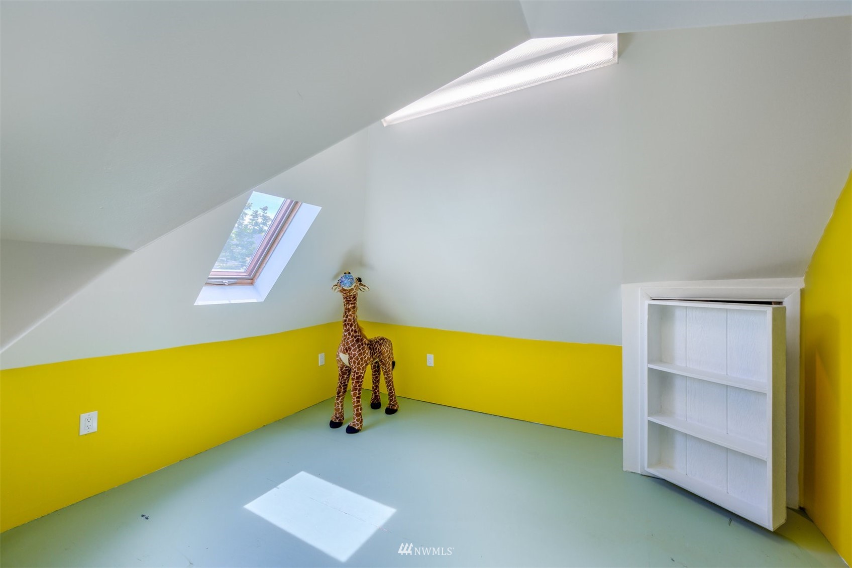 2313 Rucker Avenue Everett, WA 98201 - Photo 27 of 35 a view of an empty room with a window