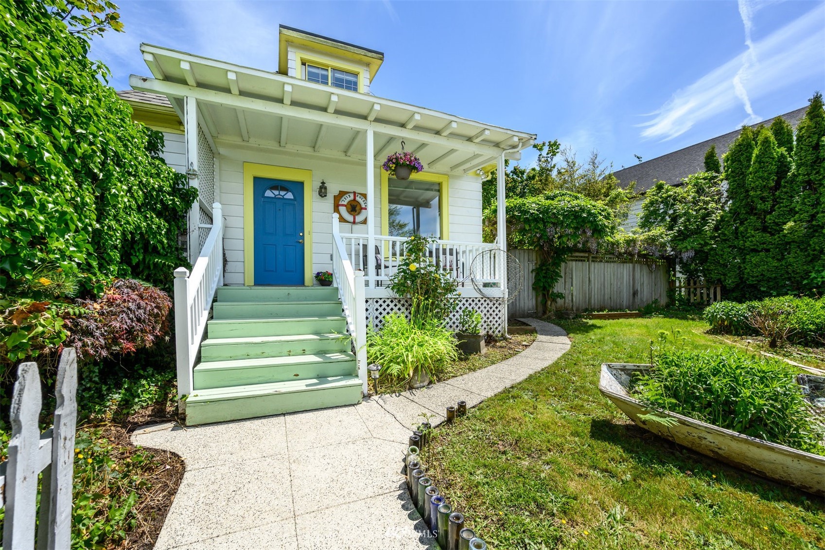 2313 Rucker Avenue Everett, WA 98201 - Photo 3 of 35 a front view of a house with a yard