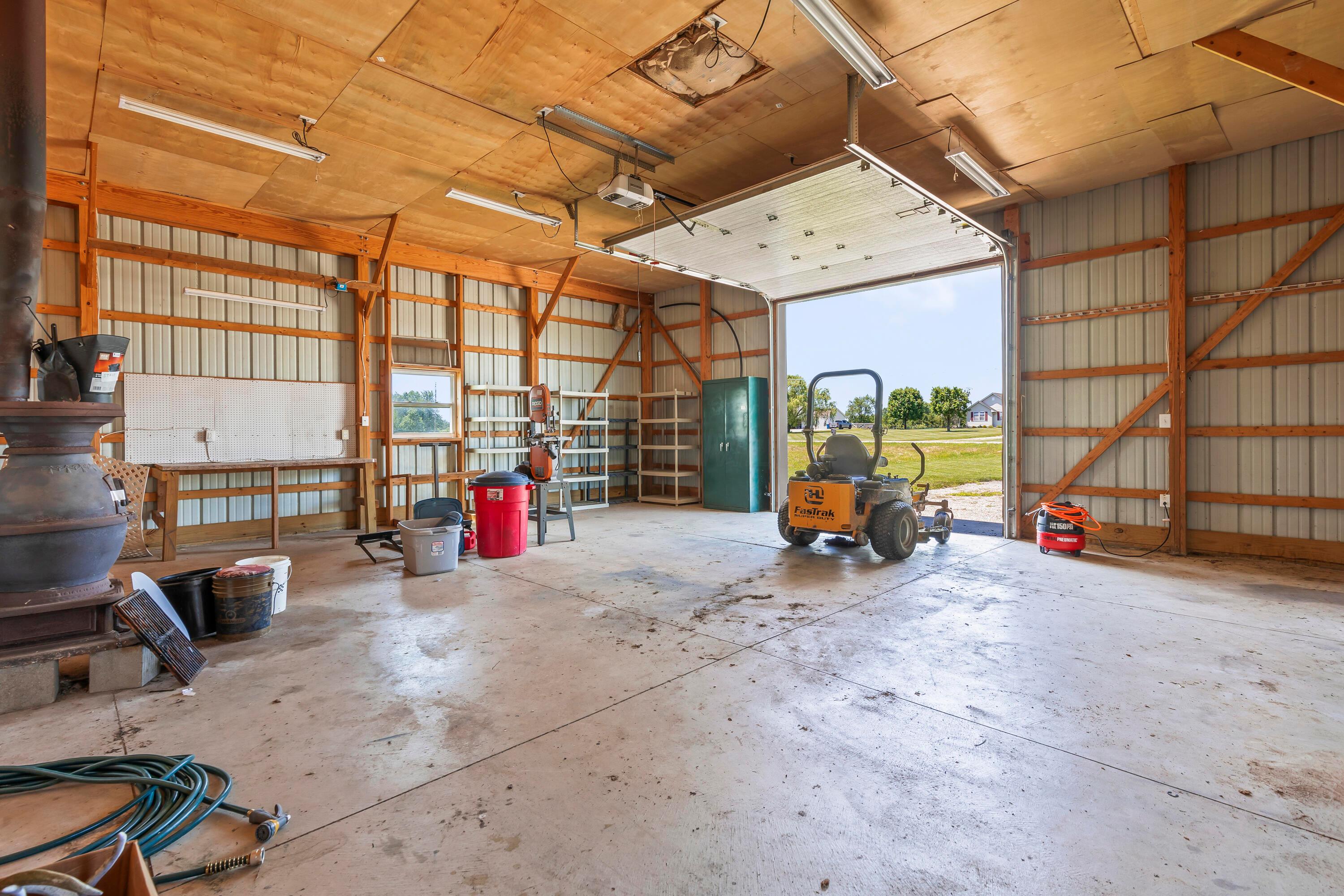 3582 Panhandle Road Delaware, OH 43015 - Photo 48 of 65 • Concrete floor • (2) man doors • (2) windows • Ceiling lights
