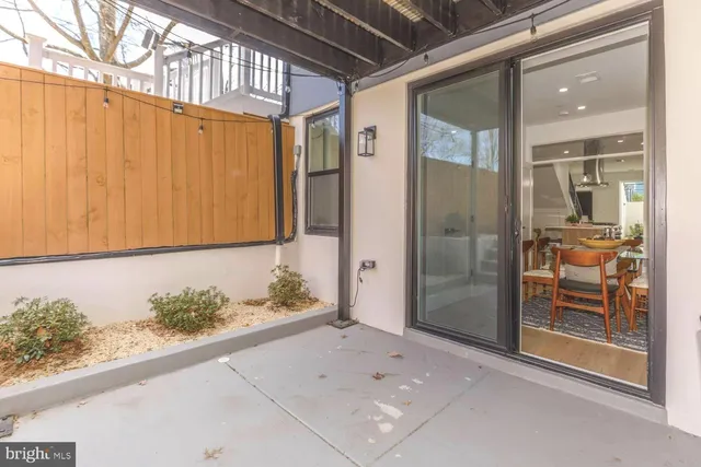 a view of an entryway with sitting area