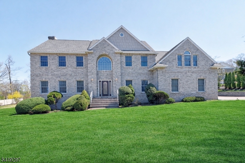24 Pine Brook Road Montville, NJ 07082 - Photo 1 of 27 a front view of a house with a yard