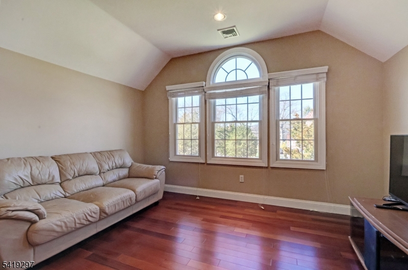 24 Pine Brook Road Montville, NJ 07082 - Photo 13 of 27 a living room with furniture and a two window