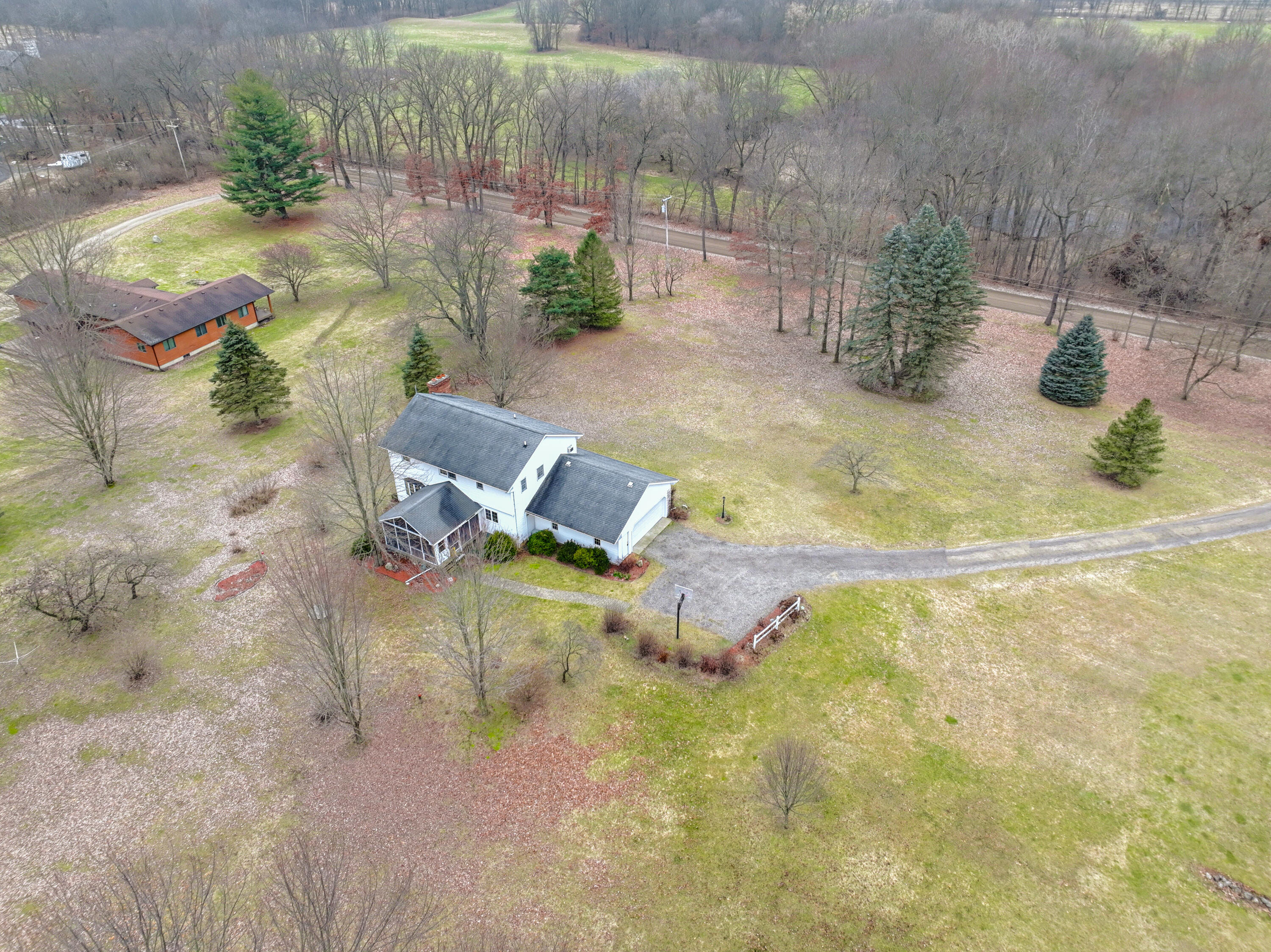 1809 Kane Road South Stockbridge, MI 49285 - Photo 4 of 46 DJI_20240205151148_0010_V